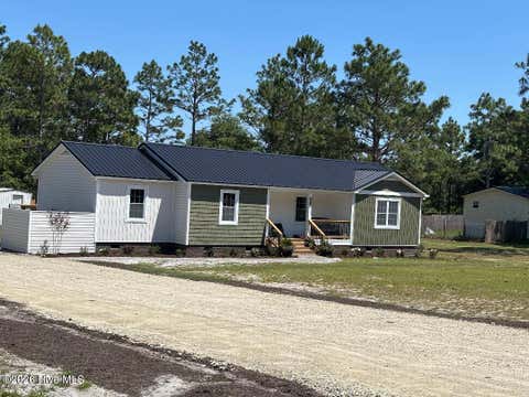 Photo of 8962 Hawks Bill Drive NE, Leland, NC 28451 (MLS # 100579785)