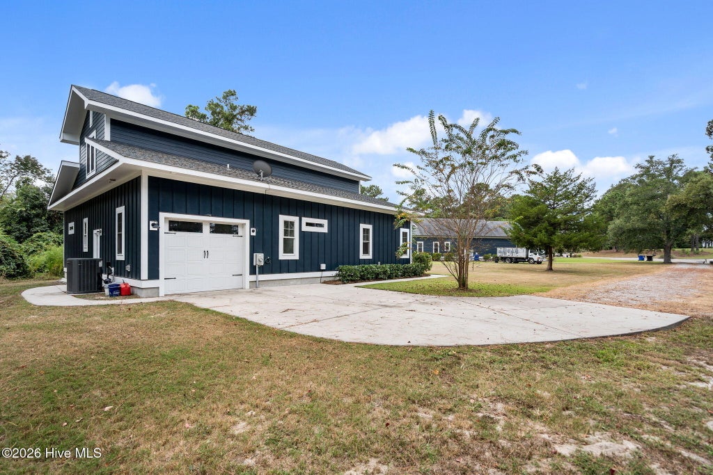 Photo of 316 E Rolling Meadows Road, Hampstead, NC 28443 (MLS # 100604200)