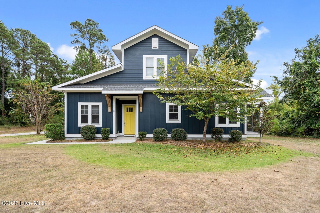 Photo of 316 E Rolling Meadows Road, Hampstead, NC 28443 (MLS # 100604200)