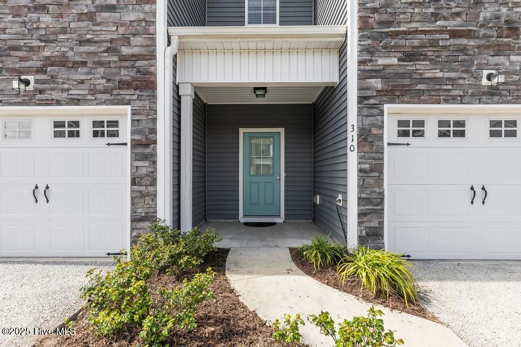 Photo of 310 S Stingray Lane, Sneads Ferry, NC 28460 (MLS # 100552044)