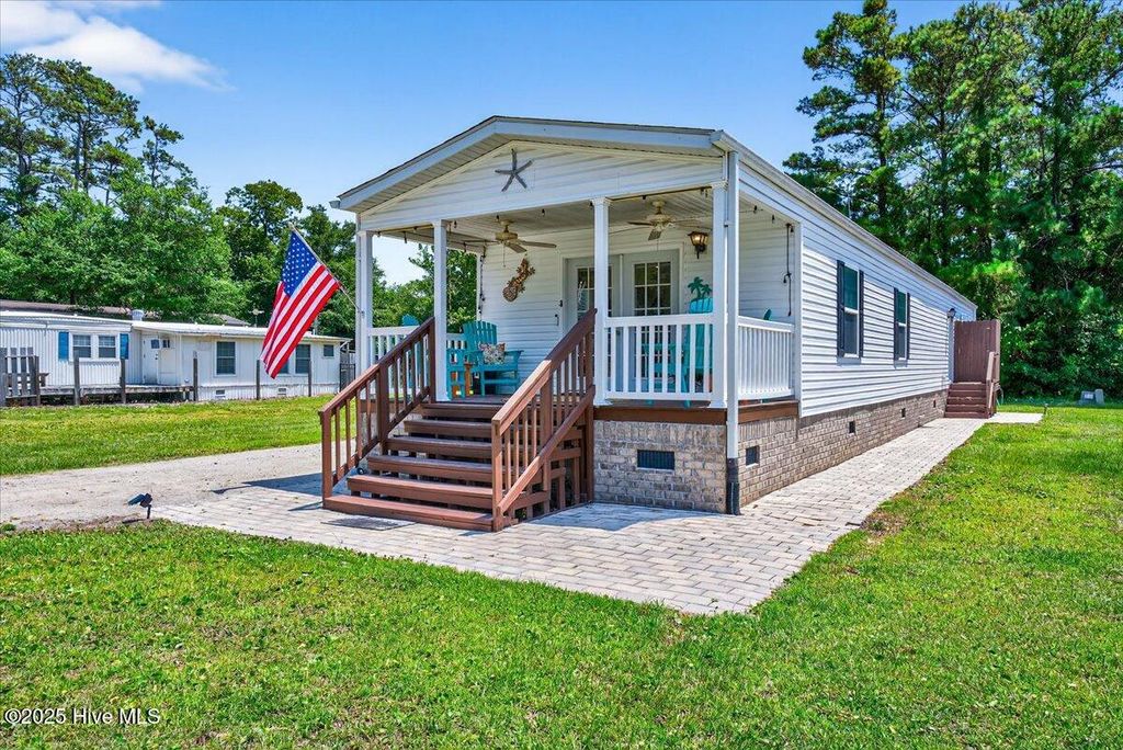 Photo of 128 NE 75th Street, Oak Island, NC 28465 (MLS # 100517576)