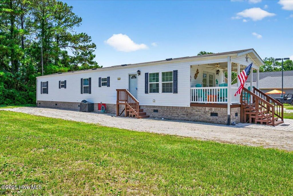 Photo of 128 NE 75th Street, Oak Island, NC 28465 (MLS # 100517576)