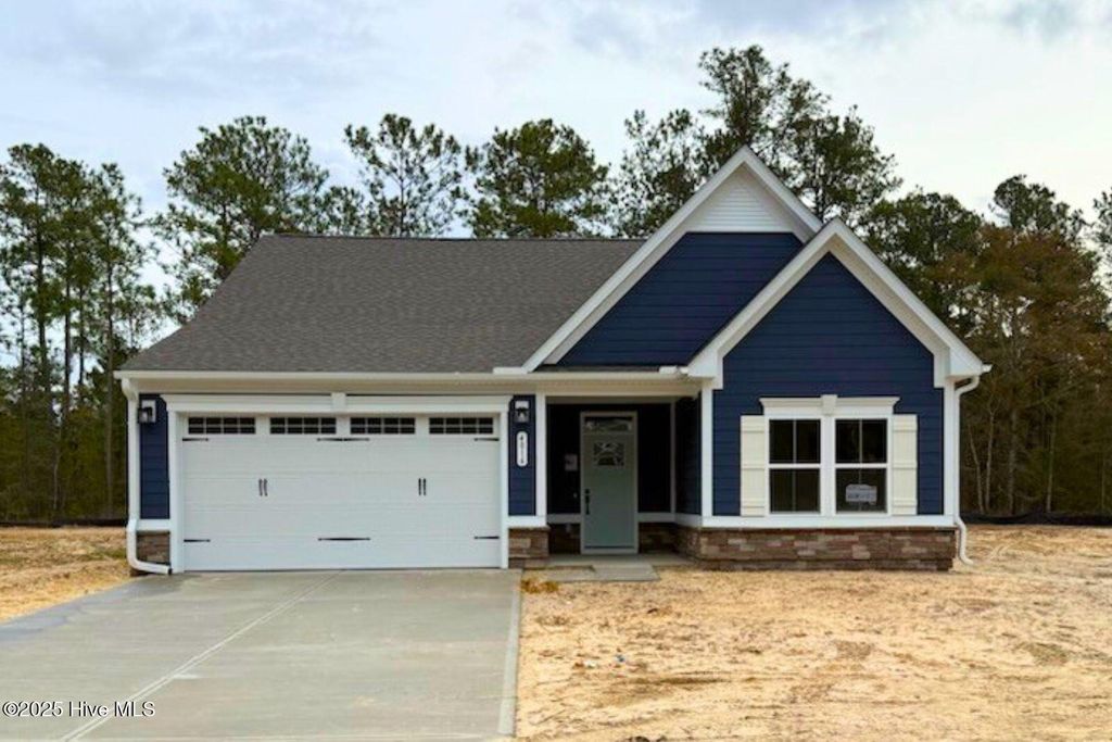 Photo of 4016 Farmfield Drive, Navassa, NC 28451 (MLS # 100542484)
