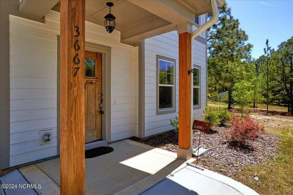 Photo of 3667 Murdocksville Road, West End, NC 27376 (MLS # 100556812)