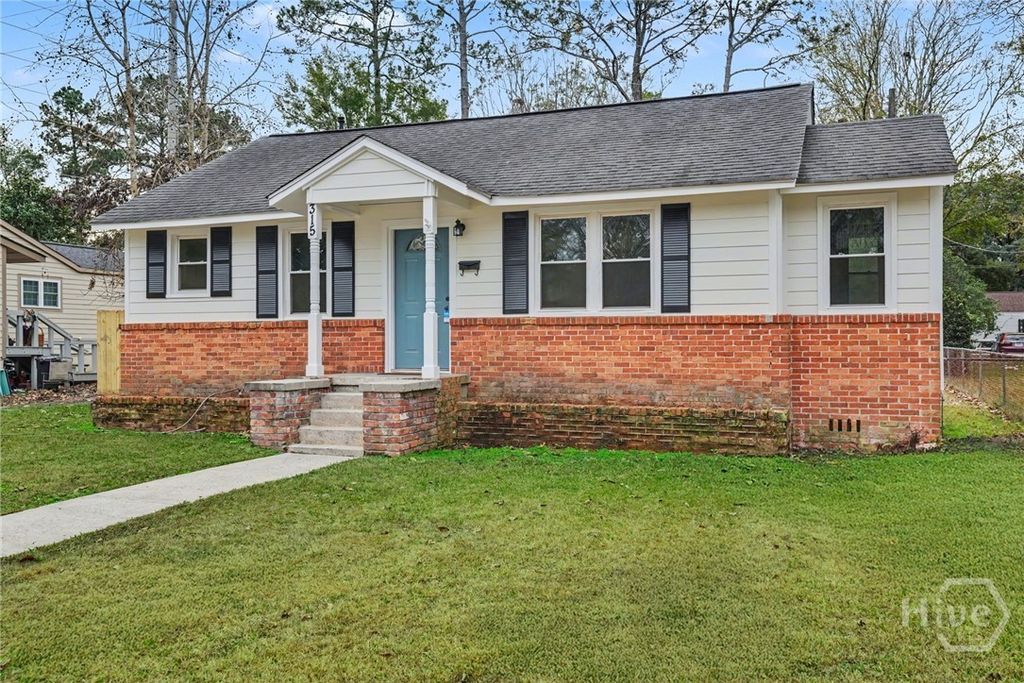 Photo of 315 E 65th Street, Savannah, GA 31405 (MLS # SA346714)