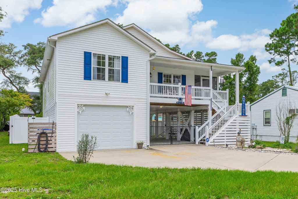 Photo of 1803 W Yacht Drive, Oak Island, NC 28465 (MLS # 100525414)