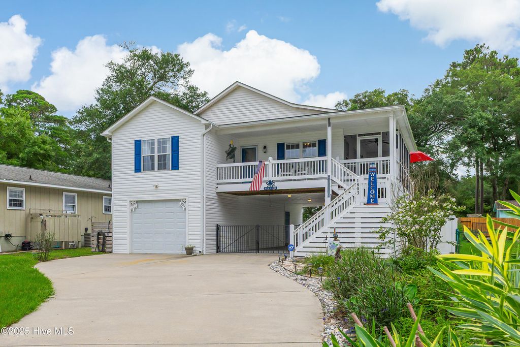 Photo of 1803 W Yacht Drive, Oak Island, NC 28465 (MLS # 100525414)