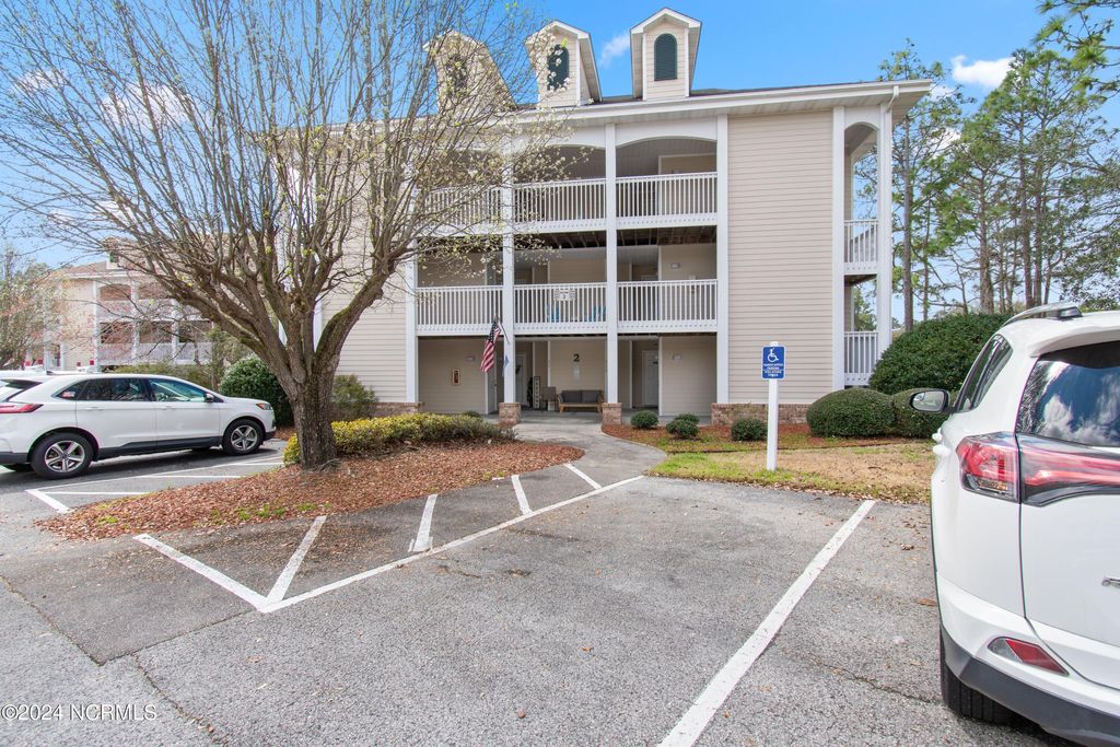 Photo of 3350 Club Villas Drive # 203, Southport, NC 28461 (MLS # 100554243)