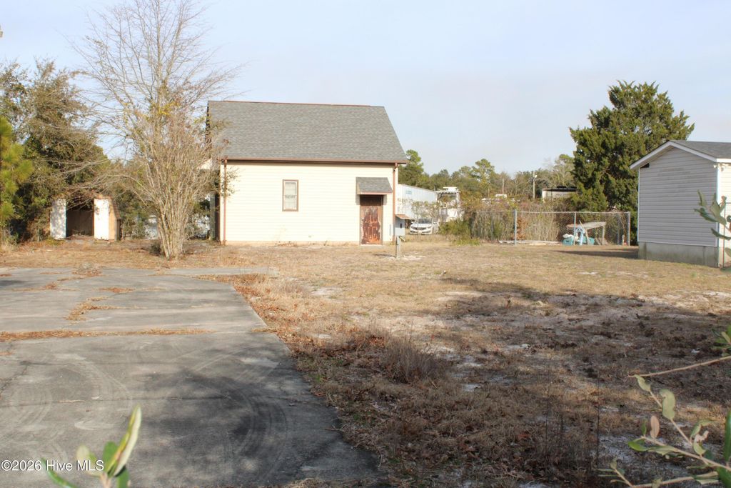 Photo of 4836 Coastal Drive SE, Southport, NC 28461 (MLS # 100550401)