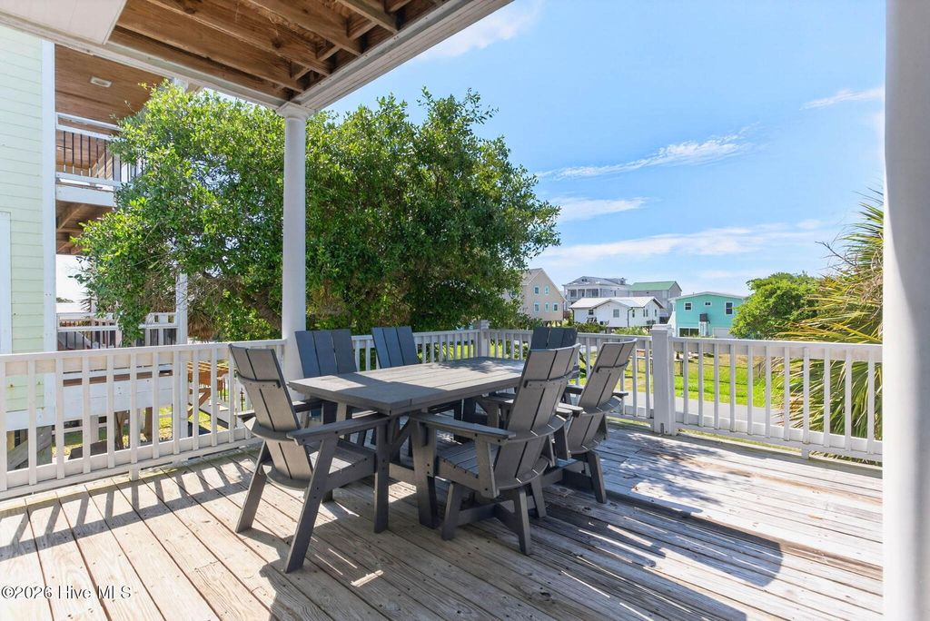 Photo of 1616 E Dolphin Drive, Oak Island, NC 28465 (MLS # 100572681)