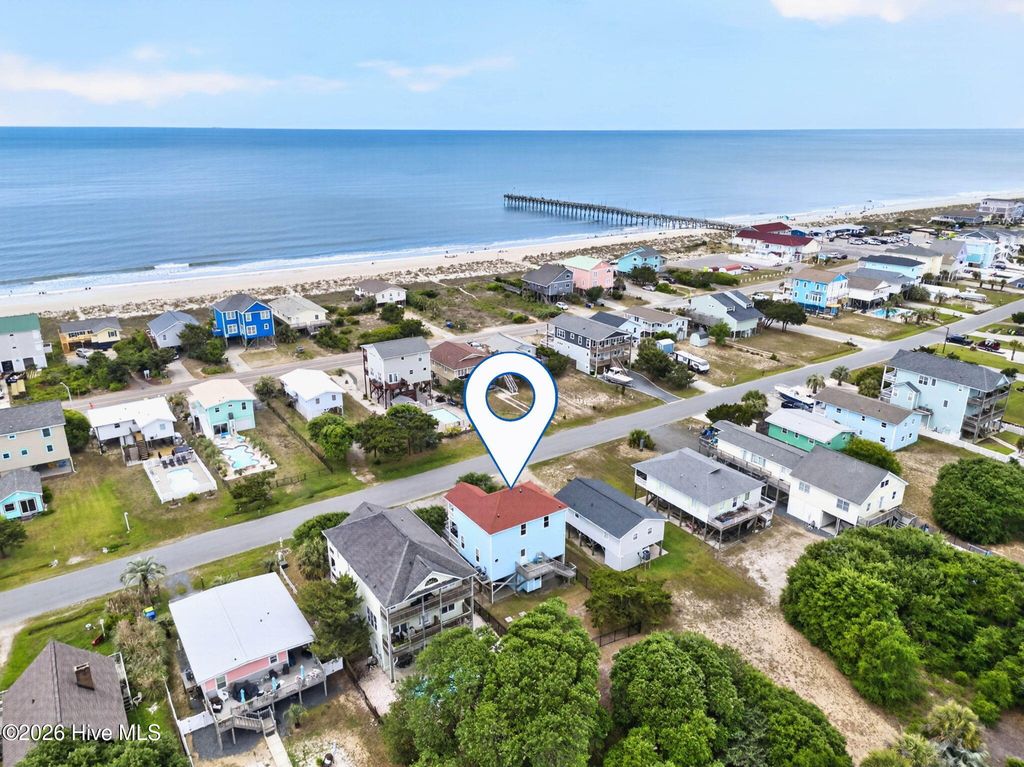 Photo of 1616 E Dolphin Drive, Oak Island, NC 28465 (MLS # 100572681)