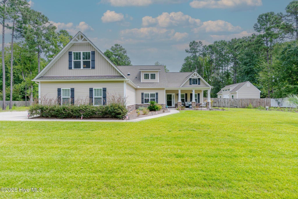 Photo of 693 Dan Owen Drive, Hampstead, NC 28443 (MLS # 100602443)