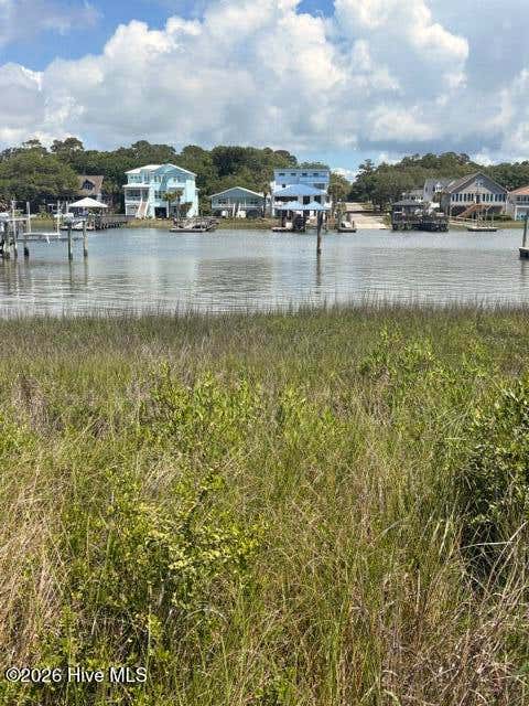 Photo of 850 Heron Landing Wynd, Holden Beach, NC 28462 (MLS # 100579751)