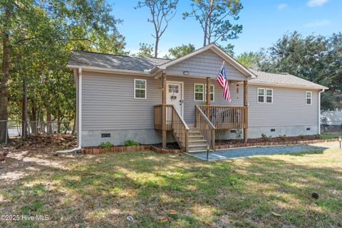 Photo of 1034 Bayside Lane, Southport, NC 28461 (MLS # 100532818)
