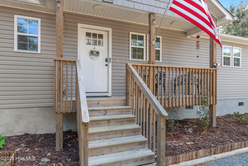 Photo of 1034 Bayside Lane, Southport, NC 28461 (MLS # 100532818)