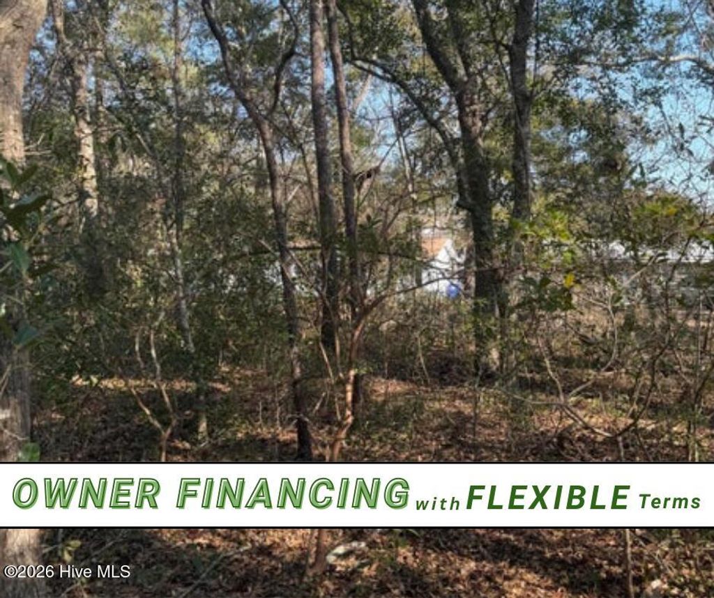 Photo of 108 NW 3rd Street, Oak Island, NC 28465 (MLS # 100553888)