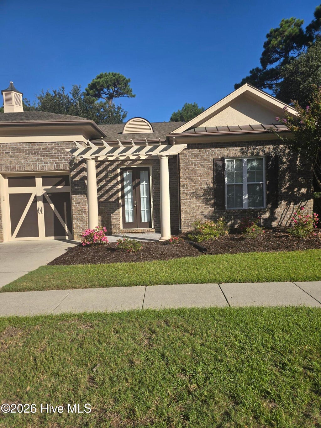 Photo of 4461 Golf Cottage Drive # 2, Southport, NC 28461 (MLS # 100606574)