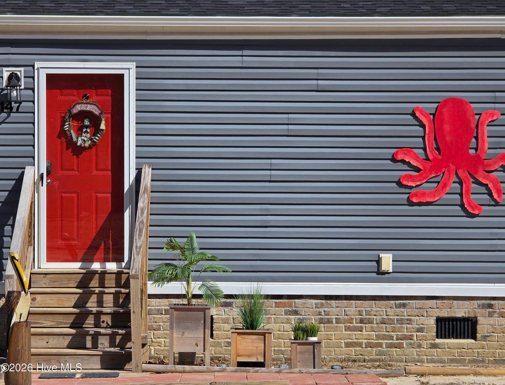 Photo of 147 Cedarwood Drive, Swansboro, NC 28584 (MLS # 100554774)