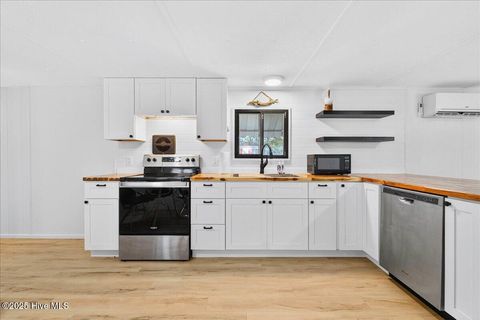 Tiny photo for 212 Dogwood Drive, Sunset Beach, NC 28468 (MLS # 100559629)