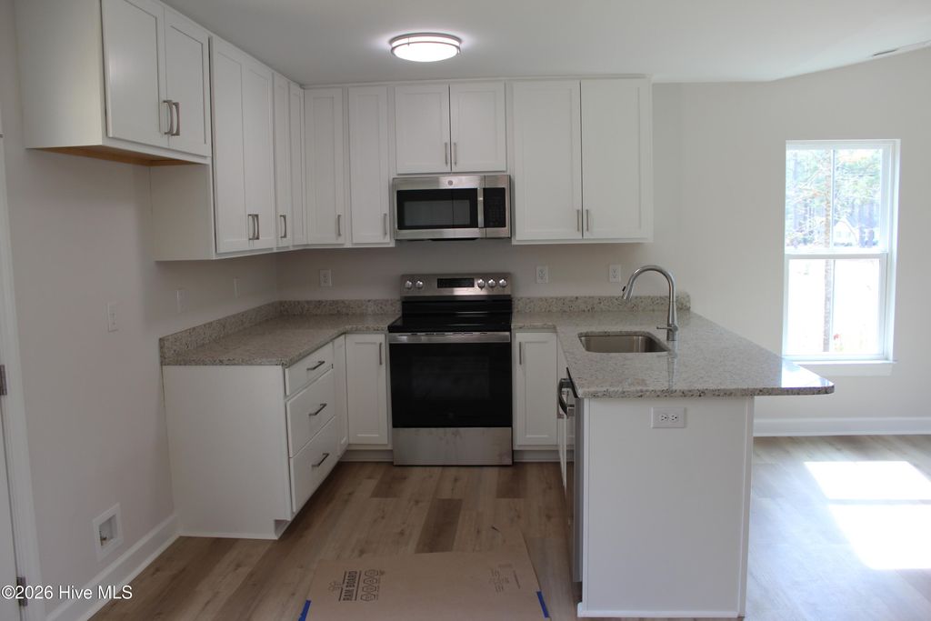 Photo of 299 Phillips Drive, Minnesott Beach, NC 28510 (MLS # 100554485)