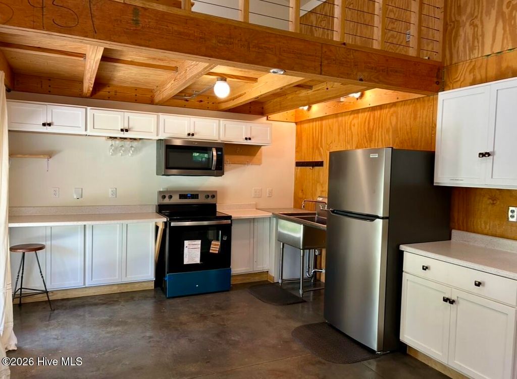 Photo of 545 Hoover Road, Hampstead, NC 28443 (MLS # 100578308)