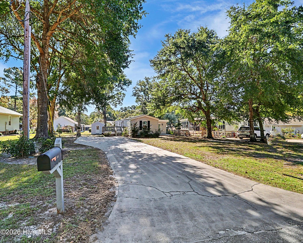 Photo of 506 Dogwood Drive, Sunset Beach, NC 28468 (MLS # 100612790)