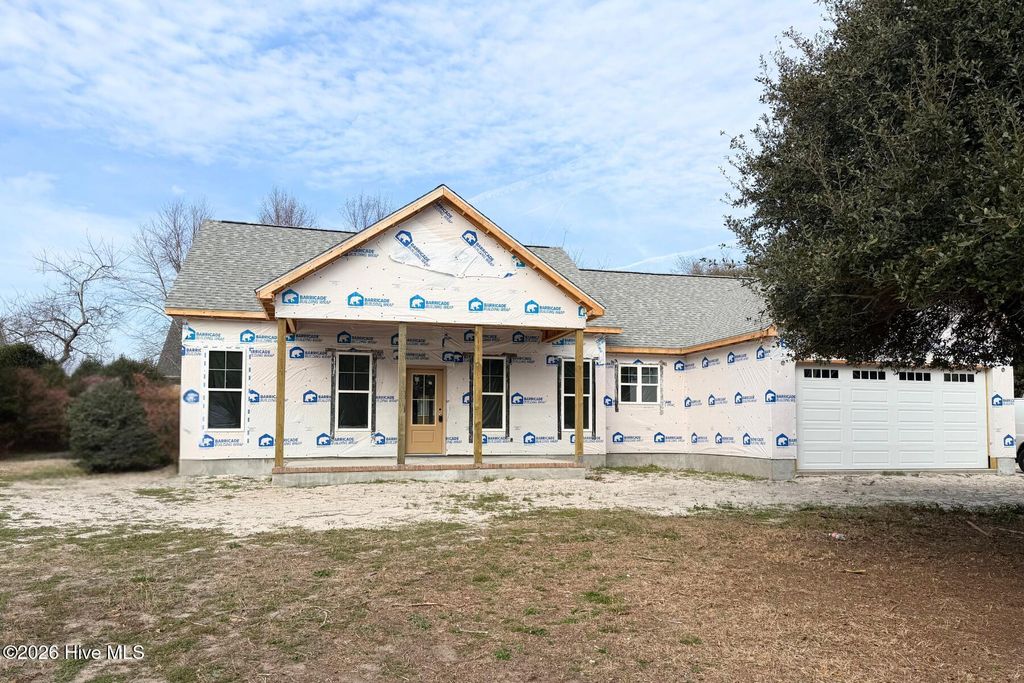 Photo of 6098 Turtlewood Drive, Southport, NC 28461 (MLS # 100543554)