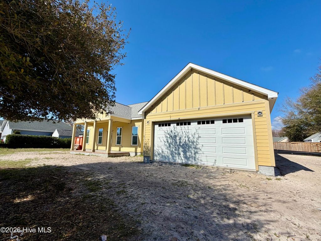 Photo of 6098 Turtlewood Drive, Southport, NC 28461 (MLS # 100543554)