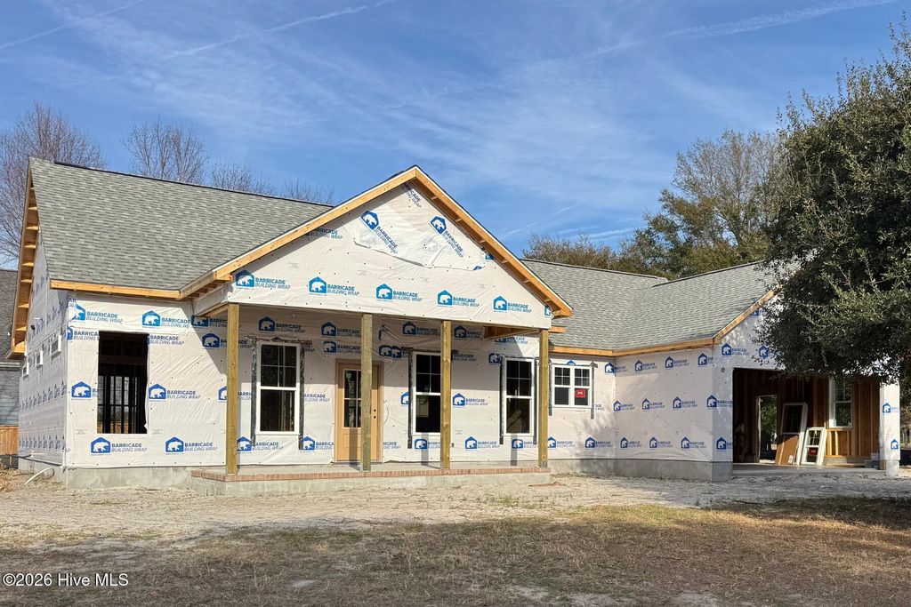 Photo of 6098 Turtlewood Drive, Southport, NC 28461 (MLS # 100543554)