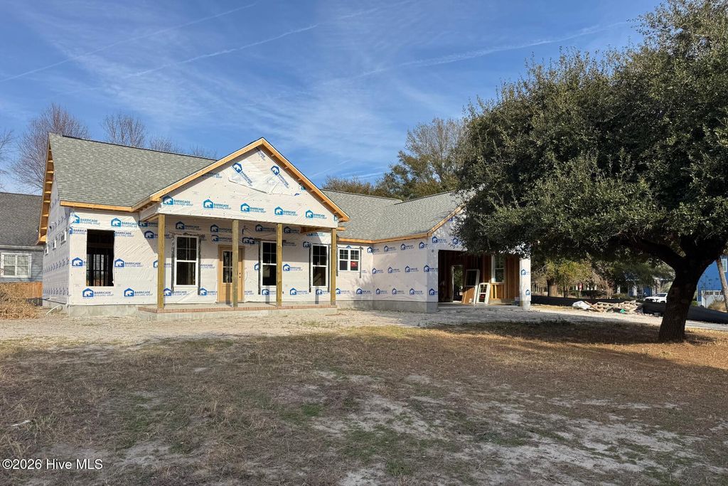 Photo of 6098 Turtlewood Drive, Southport, NC 28461 (MLS # 100543554)