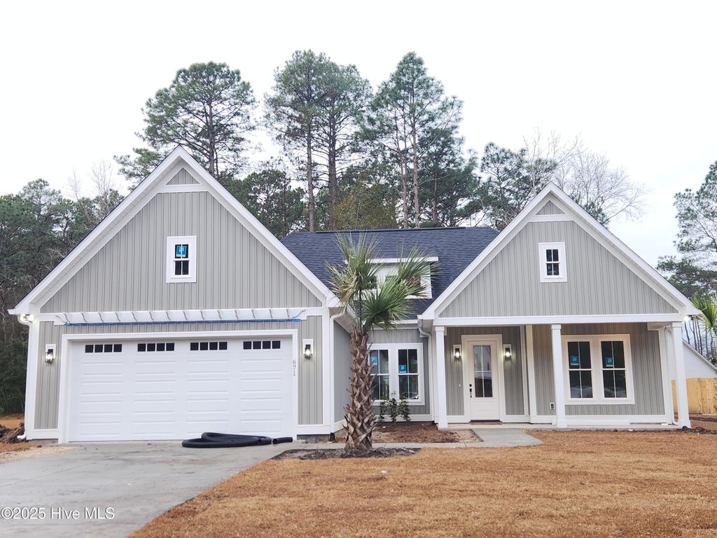 Photo of 671 Boundary Loop Road NW, Calabash, NC 28467 (MLS # 100545899)