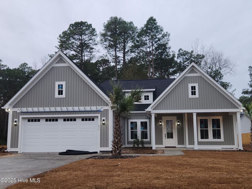 Photo of 671 Boundary Loop Road NW, Calabash, NC 28467 (MLS # 100545899)