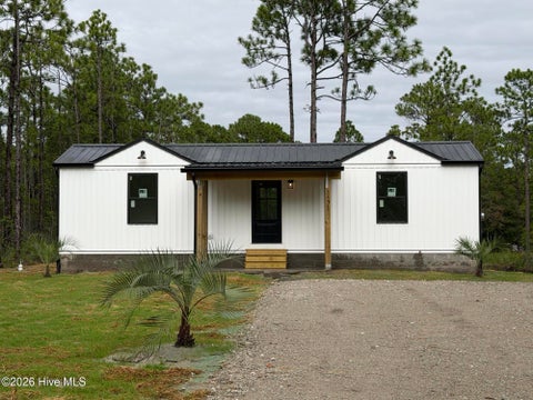 Photo of 1171 Rockingham Road, Boiling Spring Lakes, NC 28461 (MLS # 100609690)