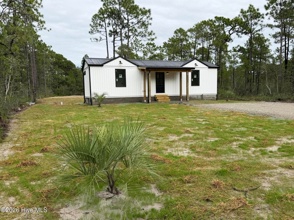 Photo of 1171 Rockingham Road, Boiling Spring Lakes, NC 28461 (MLS # 100609690)