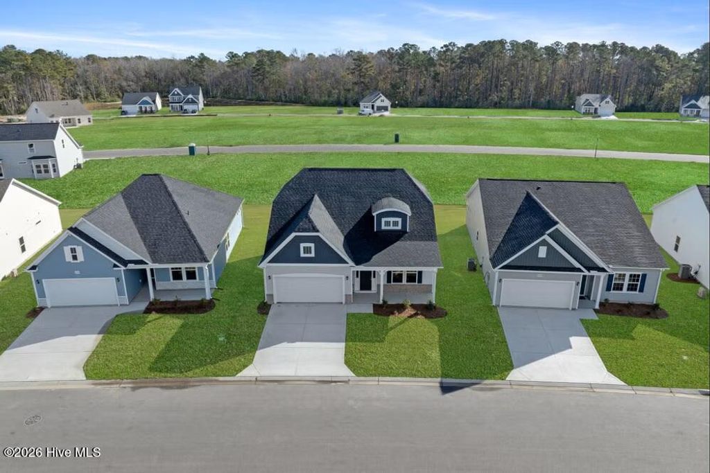 Photo of 1074 Rosefield Way NW, Carolina Shores, NC 28467 (MLS # 100577696)