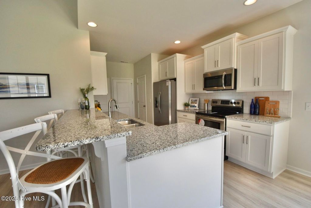 Photo of 1077 Echo Drive NE, Leland, NC 28451 (MLS # 100568374)