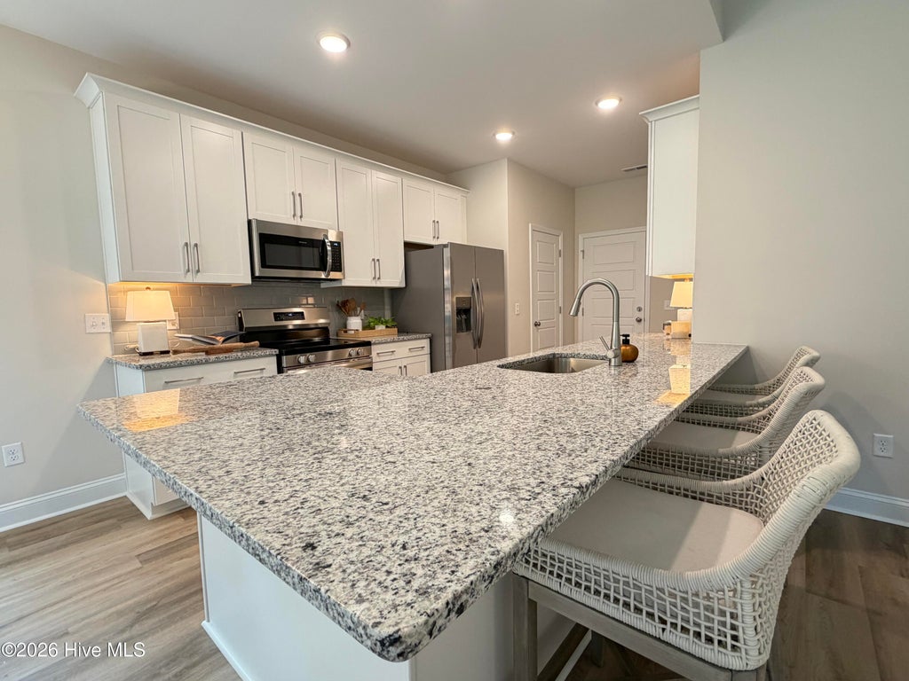 Photo of 1077 Echo Drive NE, Leland, NC 28451 (MLS # 100568374)