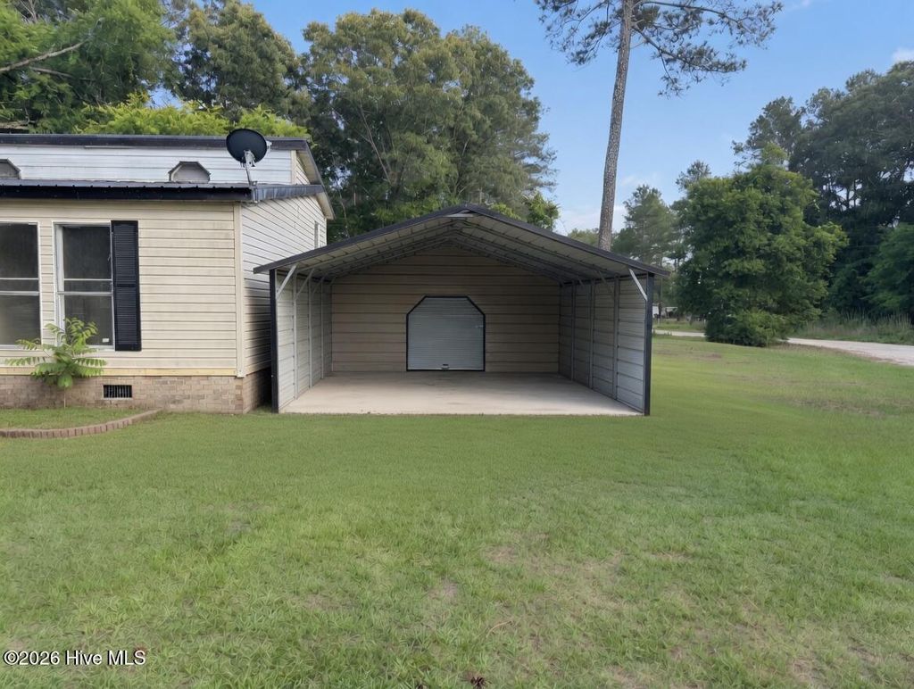 Photo of 2349 Tar Heel Road, Tar Heel, NC 28392 (MLS # 100576014)