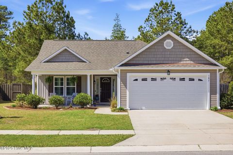 Photo of 187 Tylers Cove Way, Winnabow, NC 28479 (MLS # 100563197)