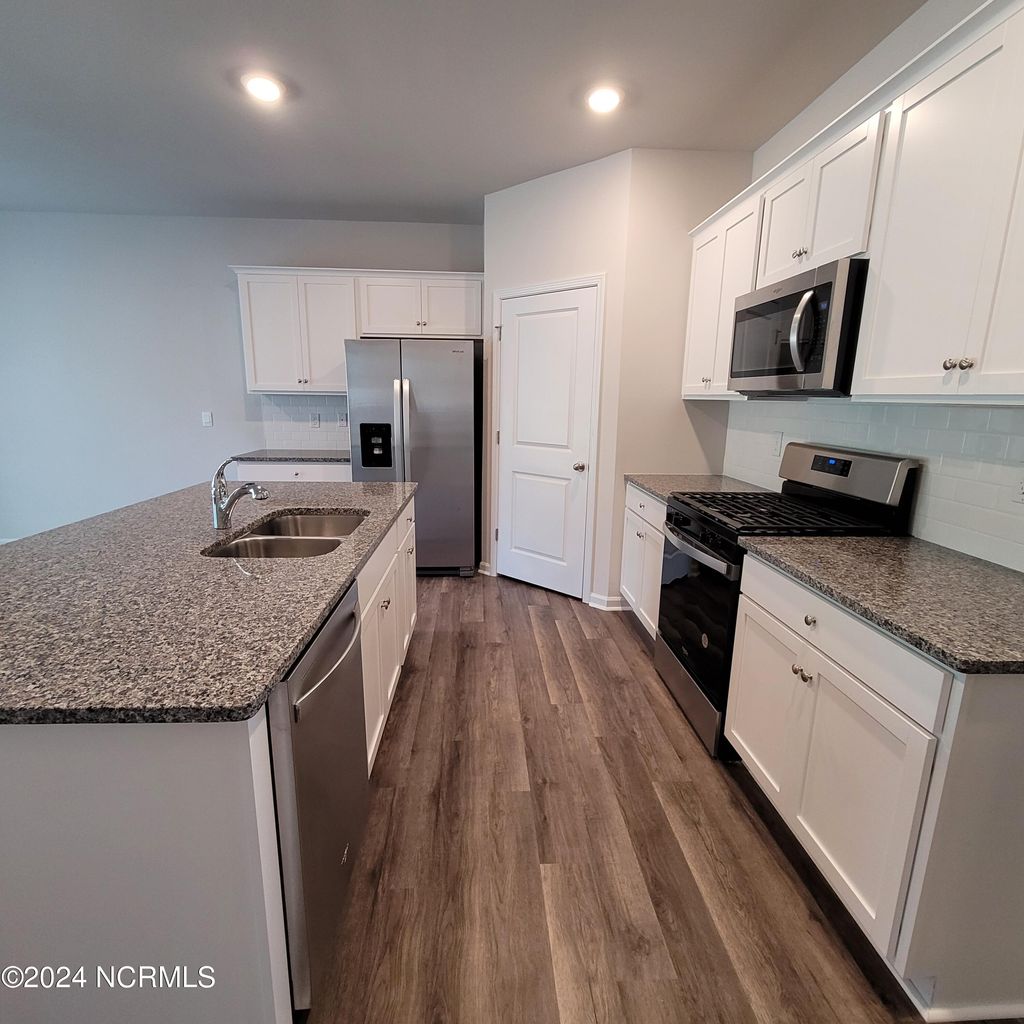 Photo of 7136 Foxhollow Lane, Leland, NC 28451 (MLS # 100573767)