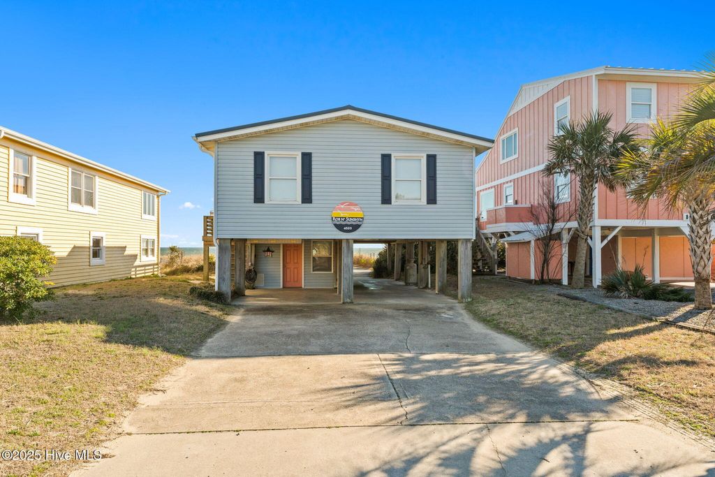 Photo of 4523 W Beach Drive, Oak Island, NC 28465 (MLS # 100492987)