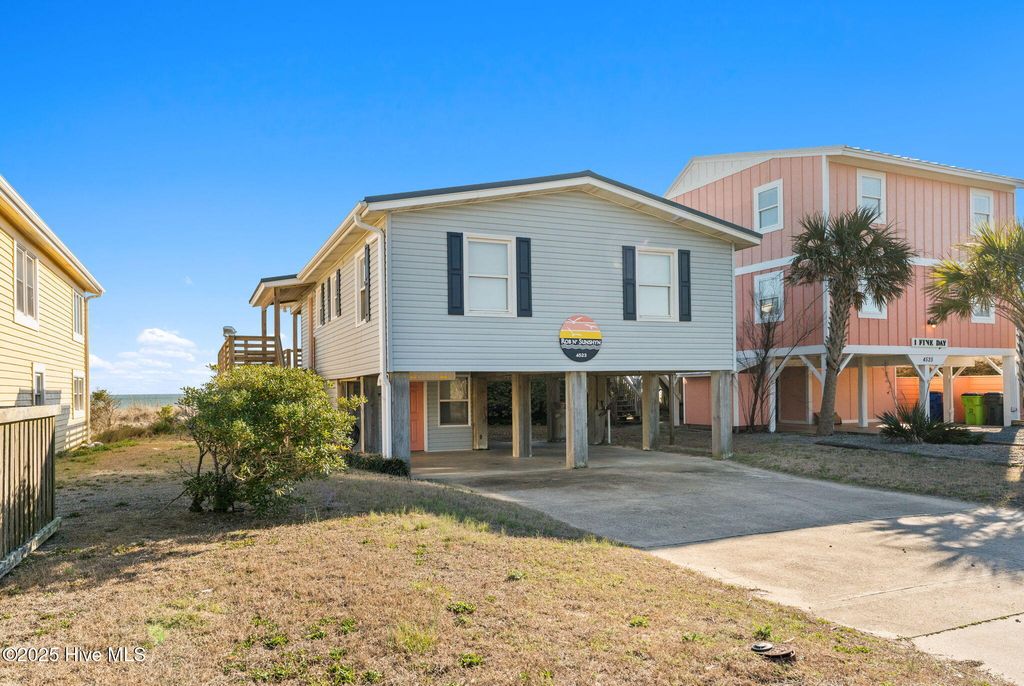 Photo of 4523 W Beach Drive, Oak Island, NC 28465 (MLS # 100492987)