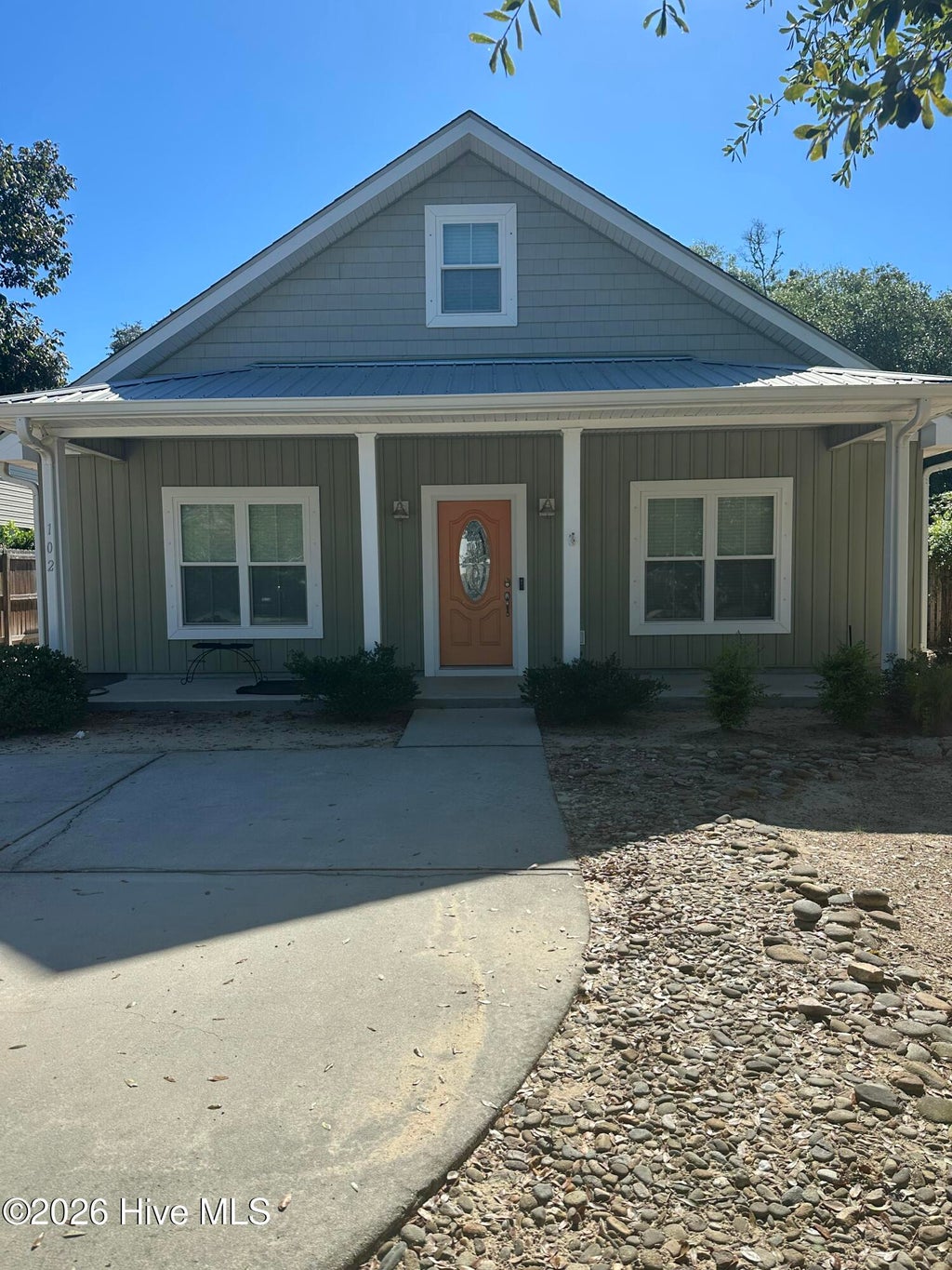 Photo of 102 NW 4th Street, Oak Island, NC 28465 (MLS # 100600160)