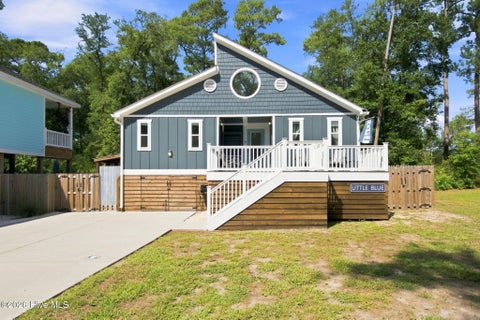 Photo of 113 NW 29th Street, Oak Island, NC 28465 (MLS # 100605932)