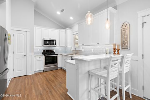 Tiny photo for 105 NW 29th Street, Oak Island, NC 28465 (MLS # 100568676)