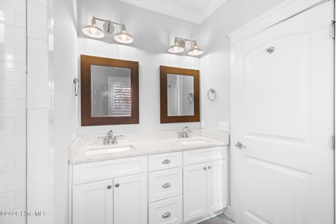 Tiny photo for 105 NW 29th Street, Oak Island, NC 28465 (MLS # 100568676)