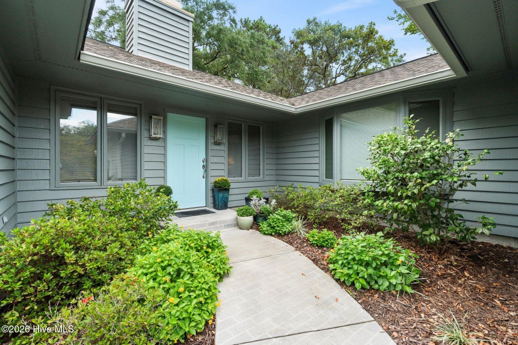 Photo of 606 Wisteria Drive, Sunset Beach, NC 28468 (MLS # 100606372)
