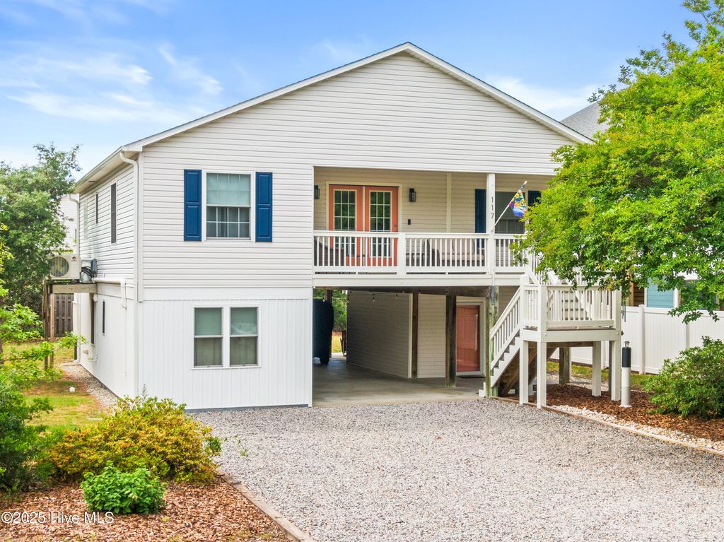 Photo of 117 NE 52nd Street, Oak Island, NC 28465 (MLS # 100553863)