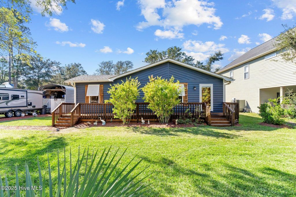 Photo of 211 NE 55th Street, Oak Island, NC 28465 (MLS # 100527496)