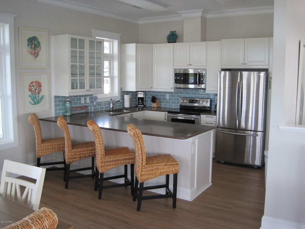 Photo of 111 N North New River Drive #B13, Surf City, NC 28445 (MLS # 100551719)